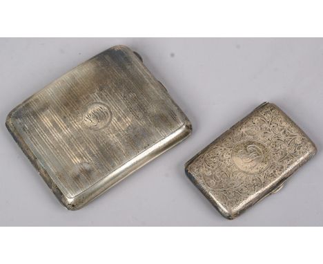 A silver cigarette case with engraved banding assayed Birmingham 1919 and a smaller silver cigarette case, assayed Chester 19