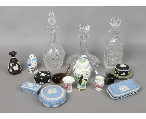 A collection of ceramics and glass including cut glass decanters, Wedgwood Jasperware, Royal Worcester snowy owl candle snuff