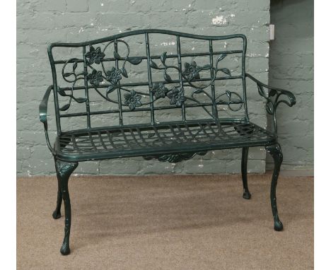 A decorative painted aluminium two seat garden bench.