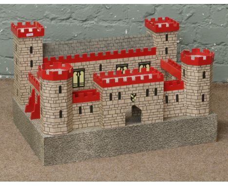 A childs toy model of a medieval castle.