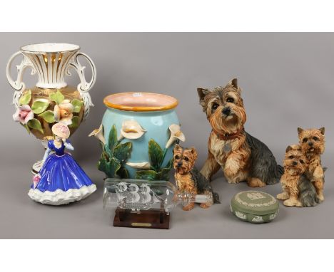 A group of decorative ceramics including a Majolica jardiniere, Royal Doulton figurine Mary, century artist models of Yorkshi