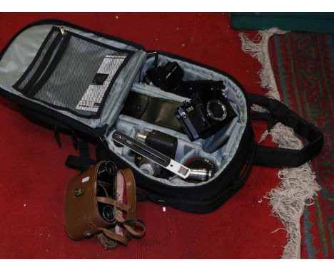 A carry case containing camera bodies, lenses and other accessories including Voigtlander Vito CSR & CEII Memotron, along wit
