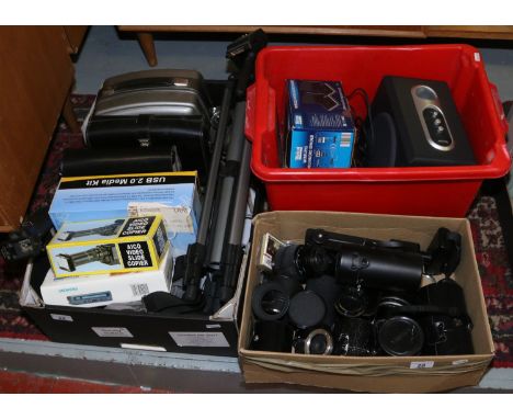 Three boxes of photographic and electrical items to include various camera lenses, Tevion speaker system, Cullmann tripod, Ke