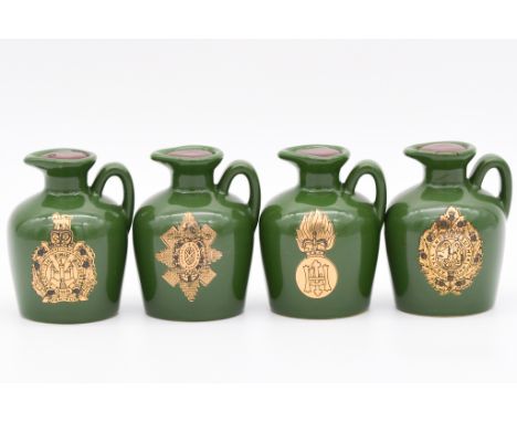 Twenty four assorted Rutherford's white ceramic decanters, blended Scotch whisky, various military and forces series, includi