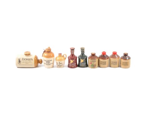 Collection of ceramic whisky miniature decanters including:Seven Masthead stoneware flagonsGlen Calder ceramic pot still deca