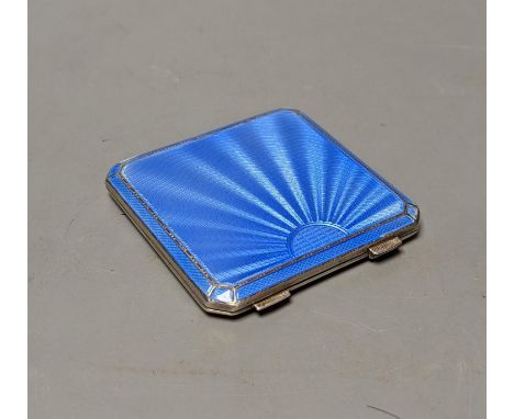 A 1930's At Deco Asprey &amp; Co silver and blue guilloche enamel compact, 74mm.