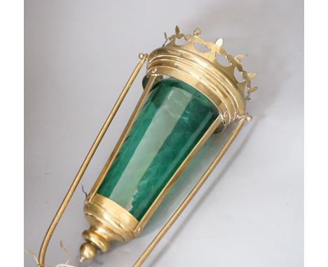 A brass and green glass processional lantern, with docking port,90 cms high.