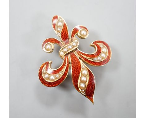 A continental 14k yellow metal, red enamel and graduated seed pearl set fleur du lis brooch, 29mm, gross weight 5.3 grams.