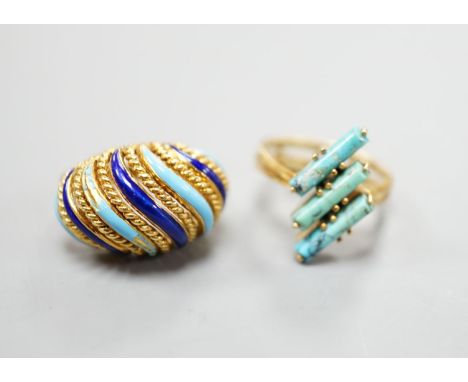 An Italian yellow metal and tow colour enamel set dress ring, size G/H and a yellow metal and three stone turquoise set moder