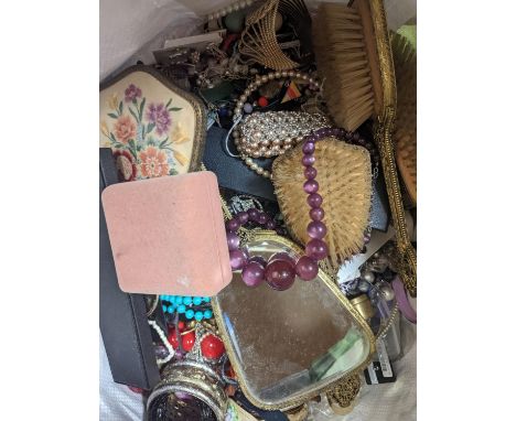 Three large bags of vintage costume jewellery.