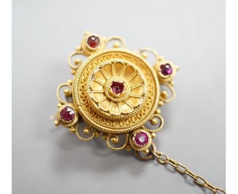 A Victorian cannettile work yellow metal and five stone ruby? chip set brooch, with safety chain, 17mm, gross weight 4.3 gram