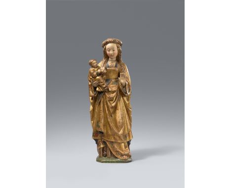 Mecheln um 1500/1510, Madonna mit KindHolz, dreiviertelrund geschnitzt, auf der Rückseite abgeflacht. Wohl originale farbige 