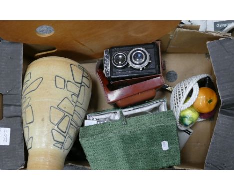 A mixed collection of items to include: Lubitel 2 Tlr Camera, Art Pottery vase, boxed witches ball etc 