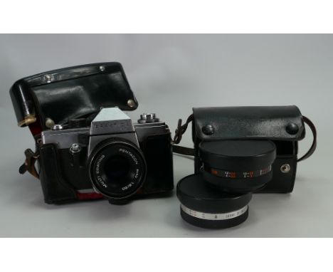Practica LTL 35mm Film Camera: Pentacon Auto 50mm lens fitted, together with Cased pair of yashikor aux telephoto lenses