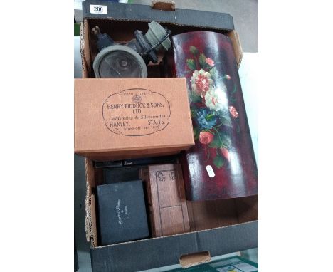 A mixed collection of items to include: early type motoring lamp, decorative boxes, boxed cutlery sets etc 