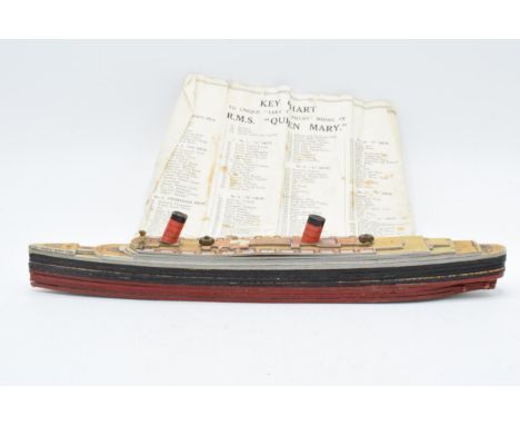 Chad Valley "Take to Pieces" model of the RMS Queen Mary with key chart.  Generally all present with some minor damages and l