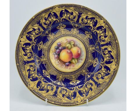 Royal Worcester cabinet plate decorated with a hand painted fruit scene signed 'S Weston', with rich blue and gilt border, 27