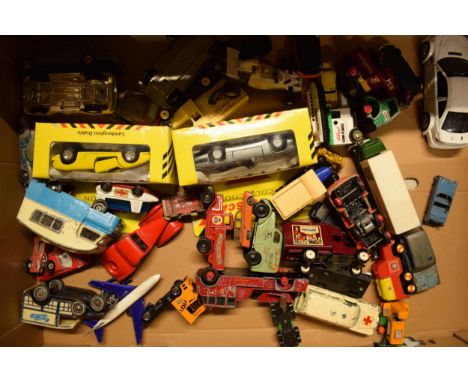 A mixed collection of vintage toys to include makes such as Matchbox Lesney, Benbros, Corgi and Dinky Toys etc (Qty).  All in