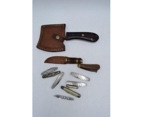 A collection of vintage pen knives of varying form and design together with a small hand axe (Qty).  
