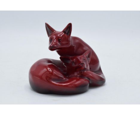 Royal Doulton Flambé pair of curled foxes HN117 (restored right ear). 13cm long.  In good condition with no obvious damage th