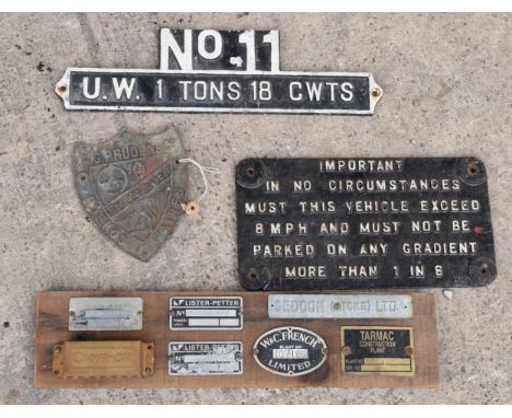 A collection of vintage cast metal signs to include No. 11 U W 1 Tons 18 CWTS, engine sign 'In No Circumstances... exceed 8 M