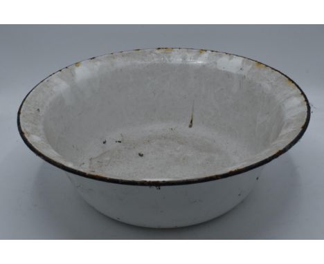 A large vintage white enamel bowl, 36.5cm diameter.  In good condition with wear as expected with enamel.