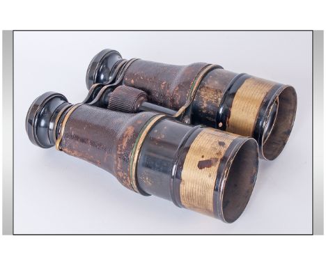 A Pair Of Vintage Racing Binoculars, leather grips. Good working order.