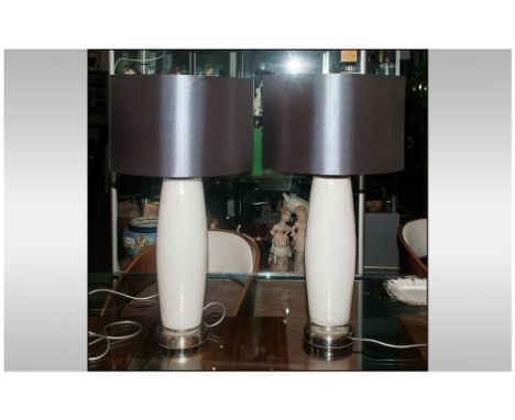 A Fine Pair of Elegant - White Glass and Chrome Table Lamps. Each With Stylish Black Shades. Each Lamp 28 Inches High. 