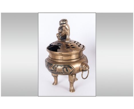 Chinese Bronze Antique Lidded After Incense Burner On A Tripod Legged Base, the body cast with birds and flowers. With Lion M