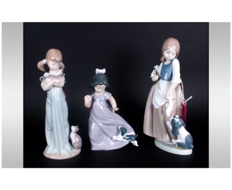 Nao By Lladro Figures, 3 in total, 'Children With Cats & Dogs' Tallest figure 9''. All figures are in mint condition.