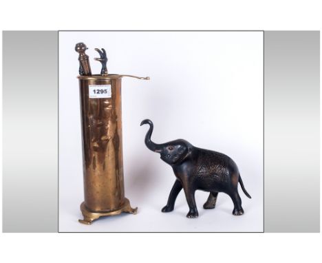 Bronze Elephant Figure, 7'' in length, 7'' in height together with a brass companion set. 