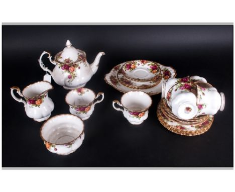 Royal Albert Country Rose Tea Set, 6 cups & saucers, 1 tea pot, sugar & cream, 6 side plates, 1 cake dish. 22 pieces.