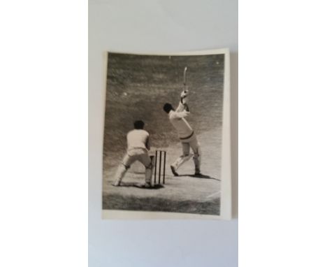 CRICKET, press photographs, West Indies All-rounder Garry Sobers inc: 12 x 8 on follow-through bowling to Richie Benaud, play