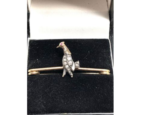 Antique rose diamond bird brooch set in gold ruby eyes and rose diamond body weight 3.6g 