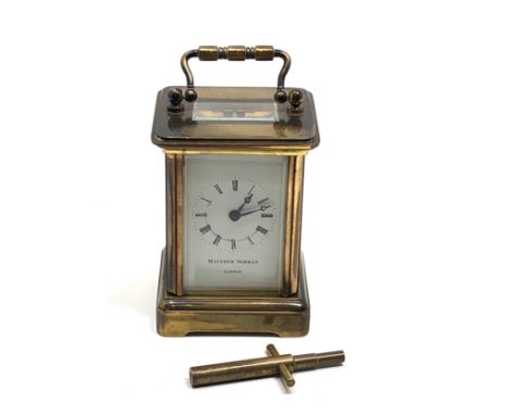 Small Matthew Norman London brass carriage clock the clock is in working order but no warranty given 