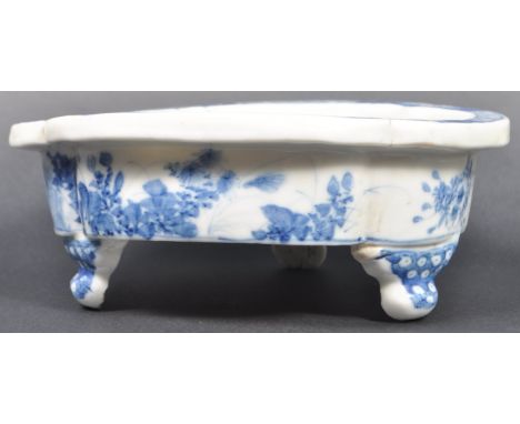 A 19th Century Japanese blue and white planter of shaped form having a painted rim with floral decoration throughout. All rai