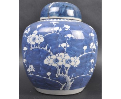 A large 19th Century Chinese Oriental Qing Dynasty Kangxi revival blue and white porcelain ginger jar and cover lid . The jar