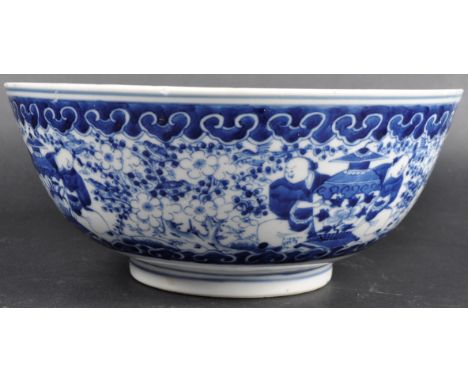 A 19th Century Chinese Kangxi mark blue &amp; white porcelain bowl having hand painted decoration to the body with figures ho