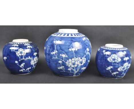 A collection of three 19th Century Chinese Kangxi revival blue and white Prunus pattern ginger jars of differing sizes compri