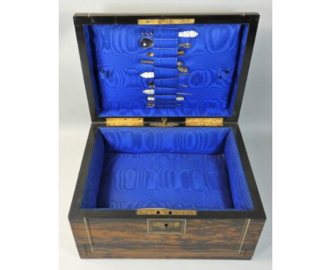 A Victorian Coromandel wood presentation sewing box, opening to reveal various mother of pearl tools and accessories, secret 