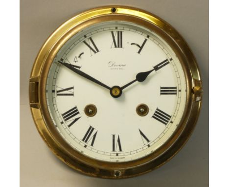 Devina - a brass ships bulk head type wall clock, with strike silent mechanism, diameter 15cm, key.
