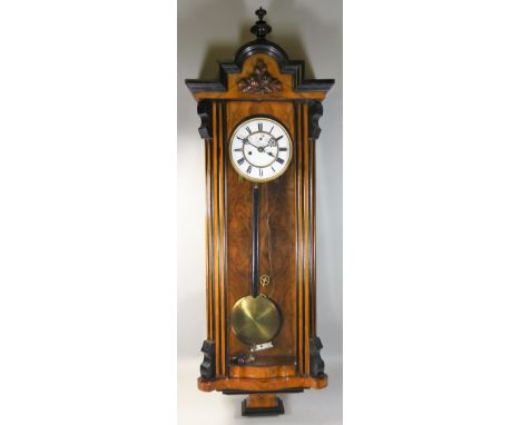 A Victorian Vienna style wall clock, the white enamel two part dial with Roman numerals, the unsigned movement numbered 14388