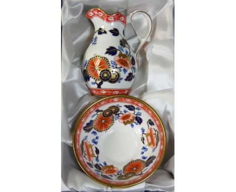 A Spode fine bone china creamer and sugar bowl set in the Ming pattern, F1905-AO, made in England, with Joseph Knox receipt o