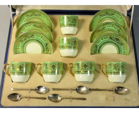 An Art Deco Cauldon china cased set, comprising set of six green and gilt demitasse coffee cups and saucers, together with EP