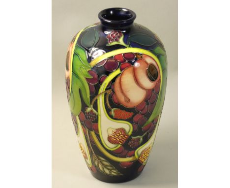 A Moorcroft 'Queens Choice' pattern tube line decorated vase, designed by Emma Bossons, impressed factory marks and xylophone