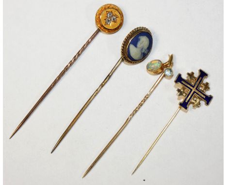 A Victorian gold stickpin inset with a diamond trefoil, an opal and aquamarine set stickpin, a Maltese Cross enamel stickpin 