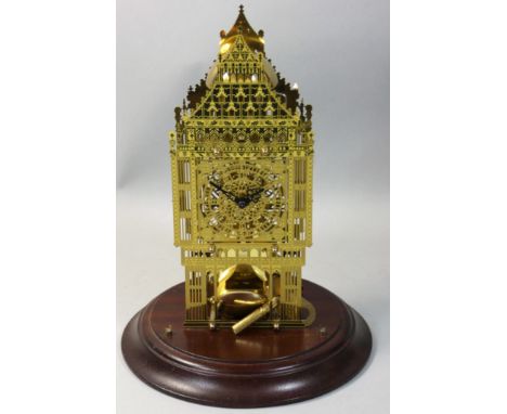 Franklin Mint - a brass skeleton clock in the form of a clock tower, with West German movement, dated 1988, under glass dome,