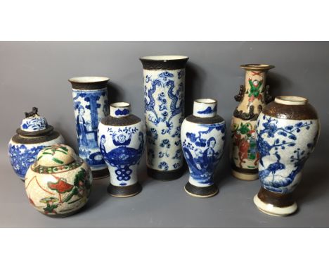 A SELECTION OF ANTIQUE AND LATER CHINESE CRACKLE GLAZED POTTERY VASES To include a near pair of blue and white vases decorate