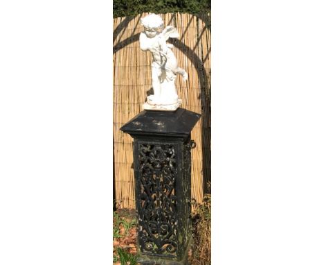 A VICTORIAN CAST IRON STATUE OF A WINGED CHERUB With bow and arrow, standing on a pierced pedestal stamped 'Steven Brothers, 