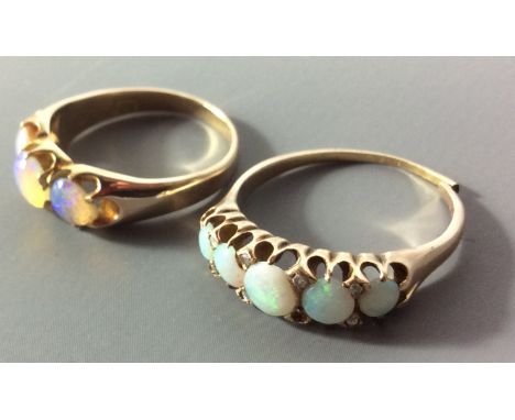 TWO LATE 19TH/EARLY 20TH CENTURY 18CT GOLD AND OPAL RINGS To include a five stone ring having a sing row of graduating caboch